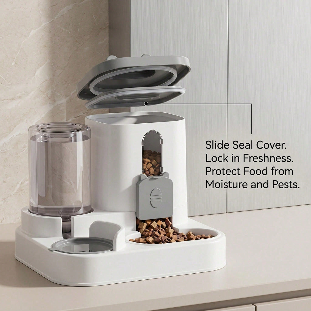 Gravity pet feeder with the food reservoir lid open